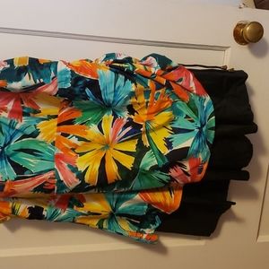 Very colorful like new one piece with skirt attached also has bra insert